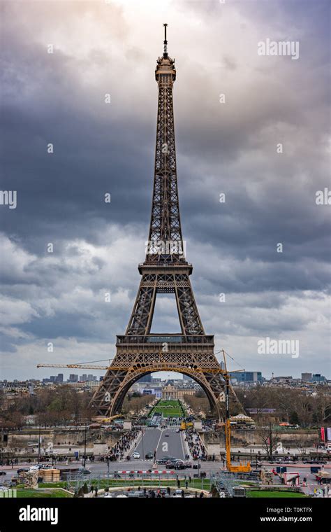 Panoramic view of the street in front of the Eiffel Tower showing cars ...