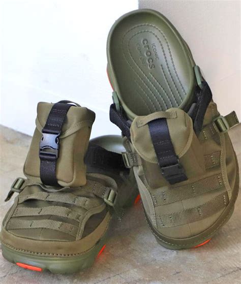 These military-styled Crocs are fitted with MOLLE Straps and a Storage Pocket To The Iconic Shoe ...