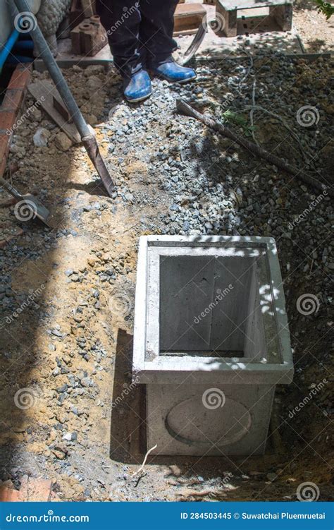 Working Install Concrete Manhole with Drain Pipes at Construction Site Stock Image - Image of ...