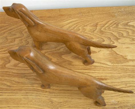 Antiques Atlas - 2 Carved Wooden Dogs as160a149 / 1203