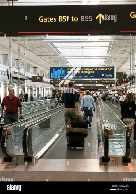 Airport Travelers, Moving Sidewalks and Gates, United Terminal, Denver International Airport, CO ...