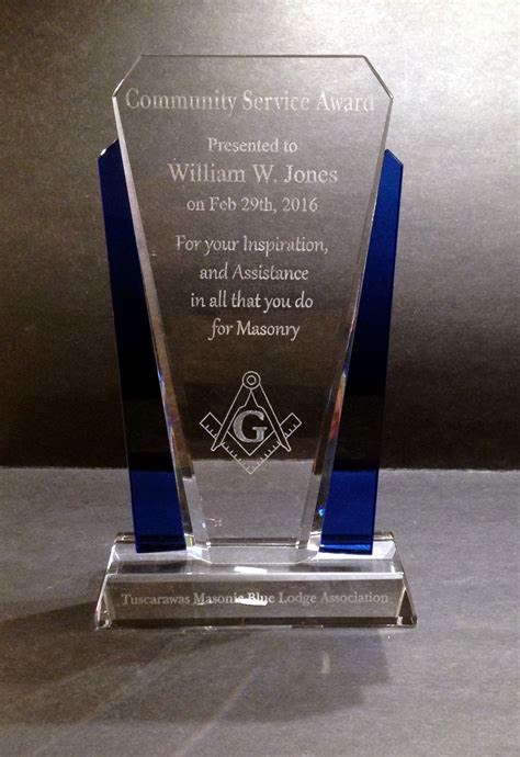 Engraved crystal award to recognized the achievements of a person in ...