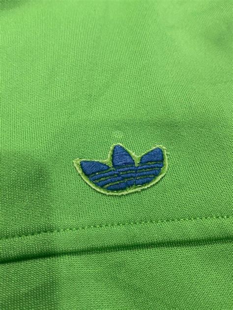 Vintage adidas track top hoodie, Men's Fashion, Tops & Sets, Hoodies on Carousell