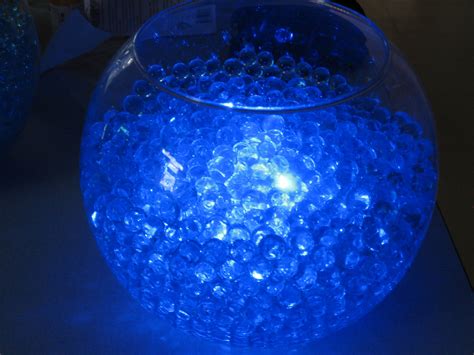 Partially completed centerpiece Blue aquagems with submerged LEDs in a ...