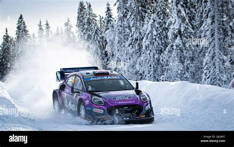 a shot of racing car in snow Stock Photo - Alamy