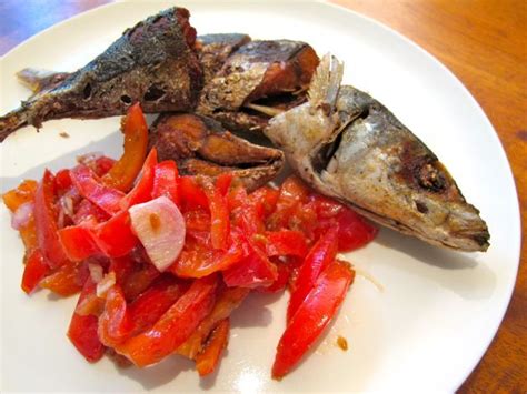 Deep-fried whole Mackerel Scad w/ a relish of tomatoes and bagoong from Market Manila. My mouth ...