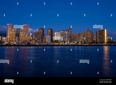 Night view of Honolulu skyline at blue hour, Oahu, Hawaii Stock Photo ...