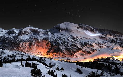 Download Winter Night Desktop With Orange Lights Wallpaper | Wallpapers.com