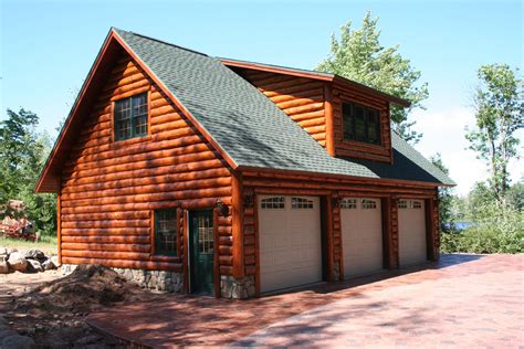 Log Cabin Garage with Lofts | garage with hand scribe log siding. There ...