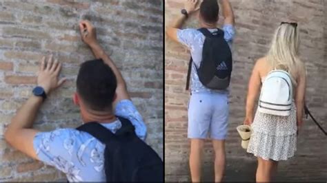 Tourist branded 'a**hole' after he's caught 'carving girlfriend's name ...