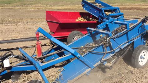 US Small Farm one row potato digger with Collection Wagon - YouTube