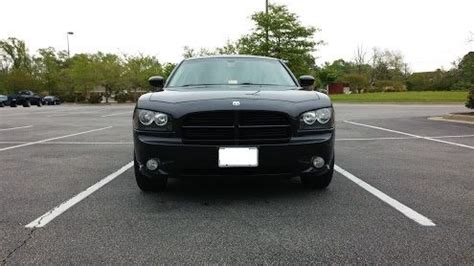 2010 Dodge Charger SXT- Black Metallic with Police Wheels