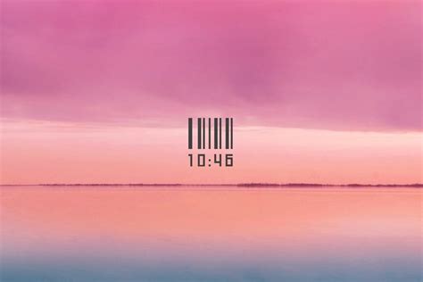 a bar code on the side of a body of water with pink and blue clouds in the background