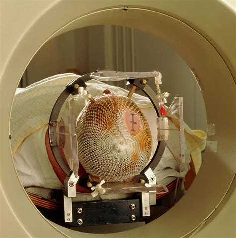 Patient Undergoing A Pet Scan Of The Brain Photograph by Cc Studio/science Photo Library