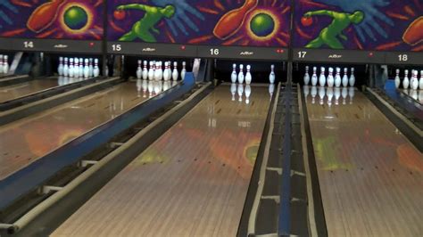 Local bowling alleys allowing children free games all summer - YouTube