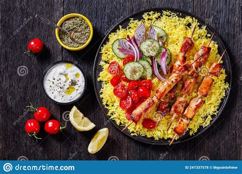 Bbq Chicken Kebabs with Saffron Rice and Veggies Stock Photo - Image of yogurt, overhead: 247337578