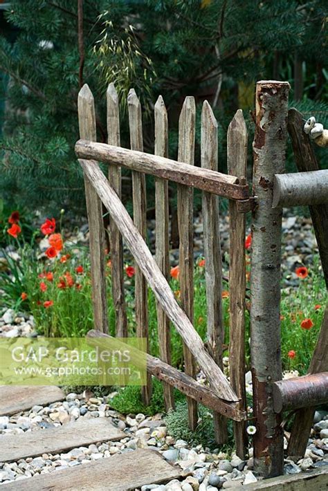 Rustic wooden gate - 'Shinglesea' garden, Chelsea 2007 | Garden gate ...