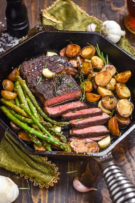 Pan-Fried Garlic Butter Steak with Crispy Potatoes and Asparagus - Host The Toast