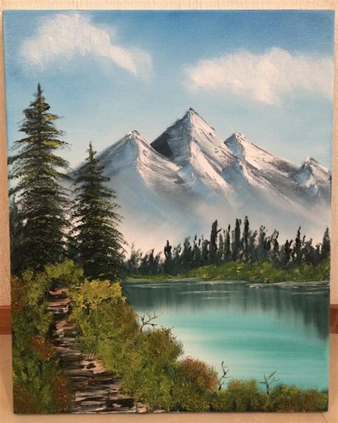 First ever Bob Ross painting, "Distant Mountains" ...pretty proud of the result, happy trees ...