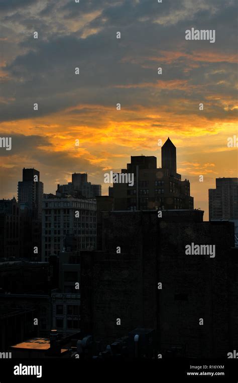 Manhattan skyline at sunset Stock Photo - Alamy