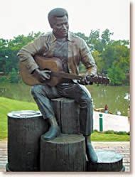 Sitting on the dock in Macon, GA with Otis Redding. | Macon, Statue, Visit georgia