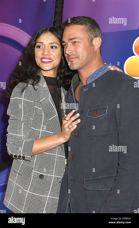 Miranda Rae Mayo and Taylor Kinney of " Chicago Fire" attend the NBC ...