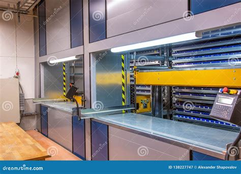 Automated Storage System in the Warehouse.Vertical Carousel Storage Unit Stock Image - Image of ...