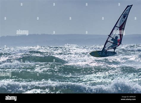 Windsurfing on West Wittering beach, West Sussex Stock Photo - Alamy