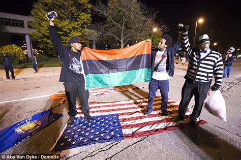 Black Lives Matter Protester Burns American Flag Outside Of GOP Debate ...