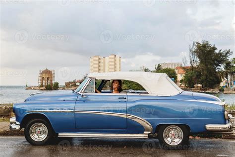 Beautiful woman driving a retro convertible car 16250358 Stock Photo at ...