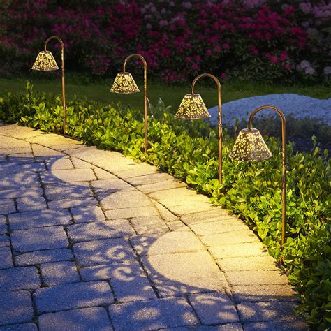 The Decorative Solar Pathway Lights - Hammacher Schlemmer