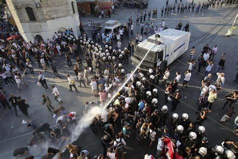 Huru-hara Akhir zaman . . .: Riot Police use a Water Cannon to disperse Demonstrators during a ...