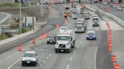 freeway traffic past construction soft focus Stock Footage Video (100% Royalty-free) 4944761 ...