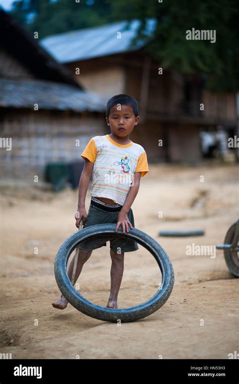 Always smiling and playful kids in Laos Stock Photo - Alamy