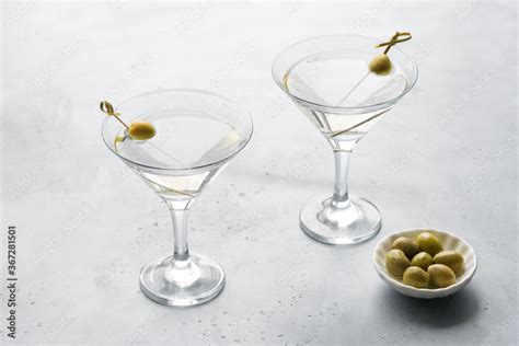 Martini with olives Stock Photo | Adobe Stock