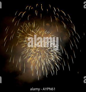 Fire crackers bursting in the sky at night Stock Photo - Alamy