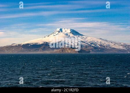 The Beerenberg Volcano on Jan Mayen surround by cloud with only the summit visible Stock Photo ...