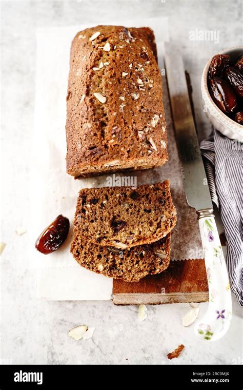 Homemade healthy date nut bread loaf, selective focus Stock Photo - Alamy