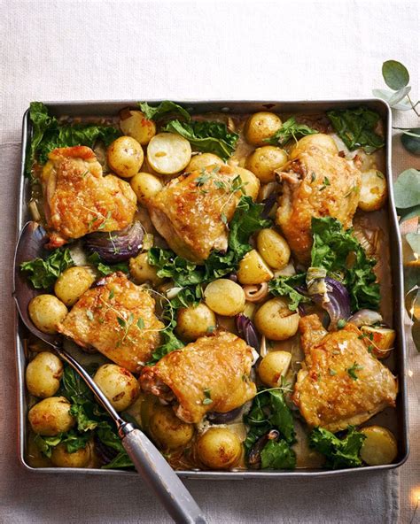 Roast chicken thighs with new potatoes and greens recipe | delicious ...