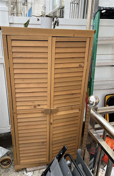 Outdoor Wooden Garden Tool Storage Cabinet - Costway