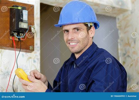Technical Electrician Measures Voltage Circuit Breaker Royalty-Free Stock Photography ...
