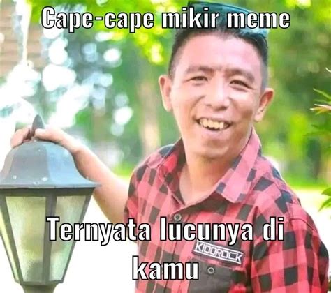 a man standing next to a lamp post with the caption cape - cape miki meme teriyata lucuya di kanu