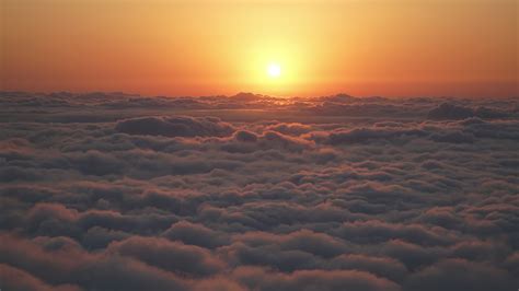 8K Amazing Sunset Over the Clouds 7690312 Stock Video at Vecteezy