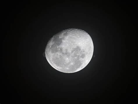 Moon through Telescope with Visible Craters and the Sea of Tranquility ...