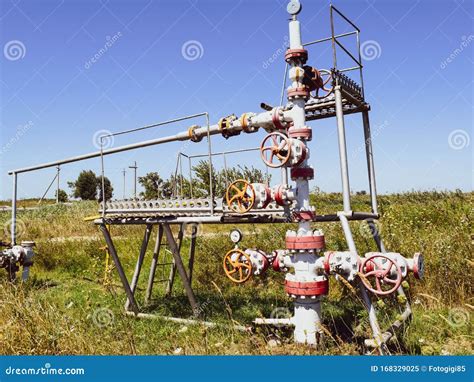 Well for Oil and Gas Production. Oil Well Wellhead . Oil Production Stock Image - Image of ...