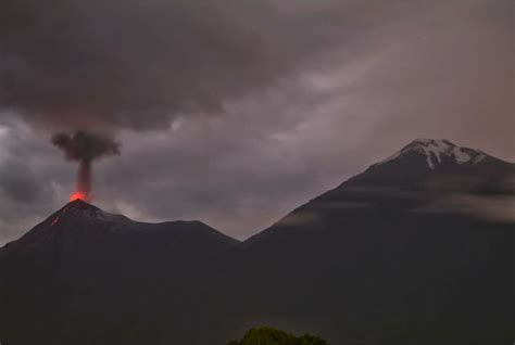 Snow capped volcano (pretty rare here) alongside his erupting brother 🌋 ...