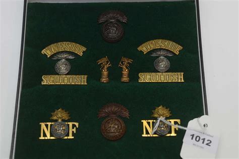 Lot 1012 - A collection of regimental cap badges