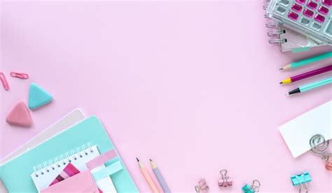 Free Photo | Various colorful stationery for school and office on pink background with copyspace