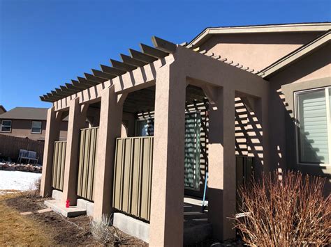 Stucco Deck Cover with Custom Rail | Custom Deck & Patio Builder | Colorado Springs