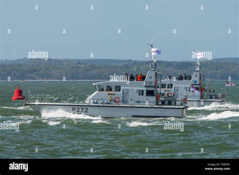 Royal Navy Archer Class patrol boats from the 1st Patrol Boat Squadron head out to sea for a ...